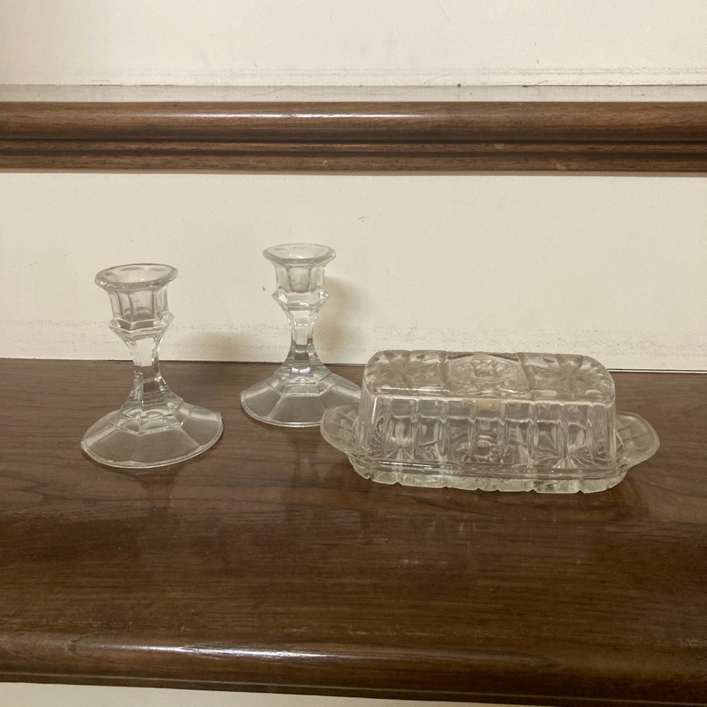 Vintage glass candlesticks and butter caddy